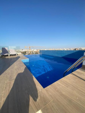 Magnifique Appartement avec PISCINE sur le toit, 3 Chambres, 4 Salles de Bain, Salle de Gym et Terrasse, LUXE ET COMFORT aux ALMADIES